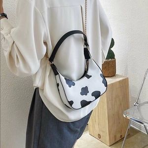 New Cow Print Baguette Bag